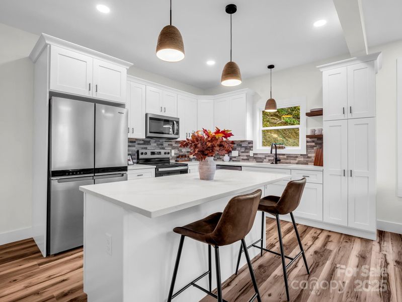 Island for extra seating and entertaining