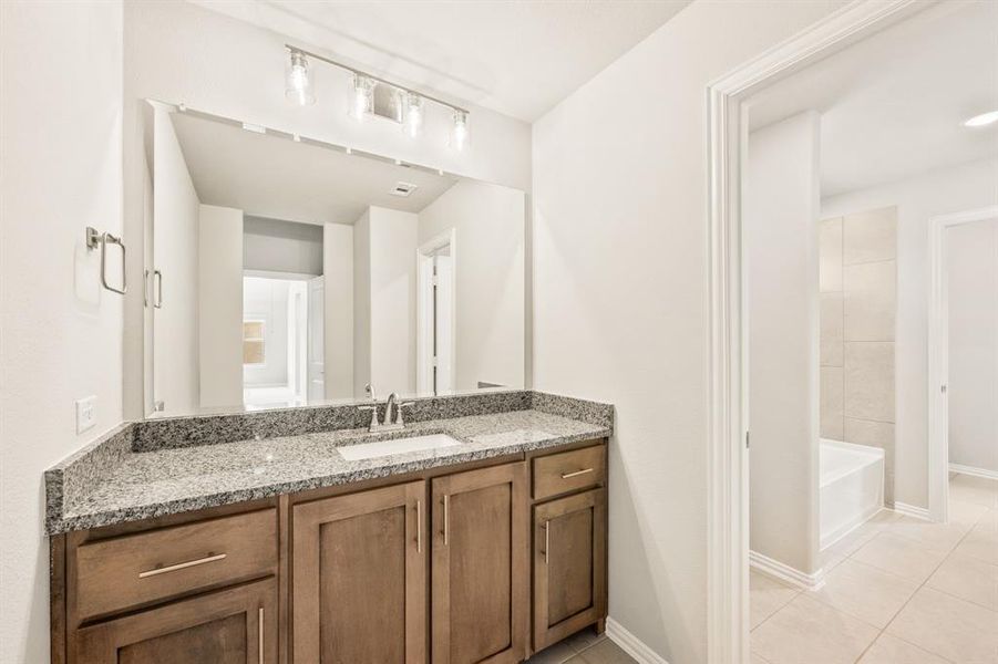 Furnished interior view inside a new home in Creekview Meadows, Pilot Point (Image 16).