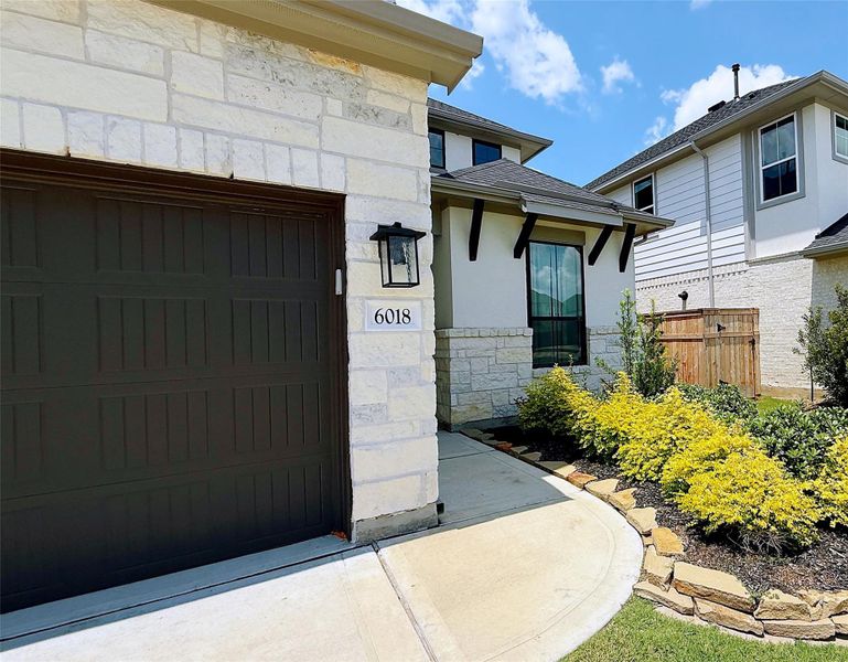 Front exterior of a new home in , Fulshear, TX, highlighting curb appeal (Image 20).