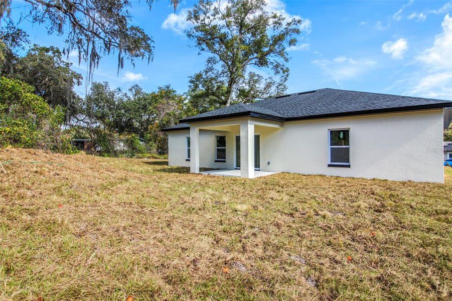 Exterior details and patio area of a home in , Deland (Image 4).