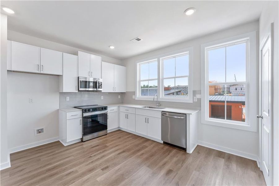 Furnished interior view inside a new home in Array, Atlanta (Image 8).