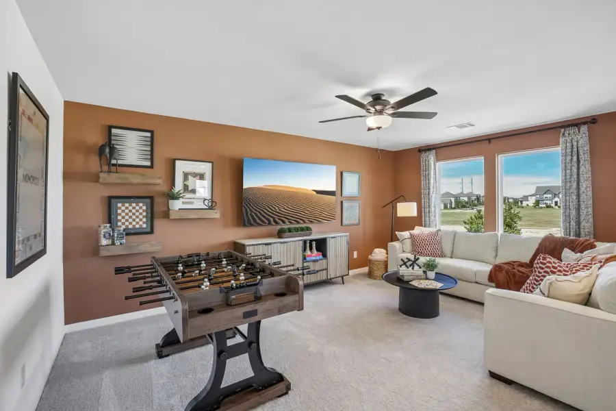 Representative furnished interior of a home built from the Sparrow by Taylor Morrison in Longview, Del Valle (Image 13).