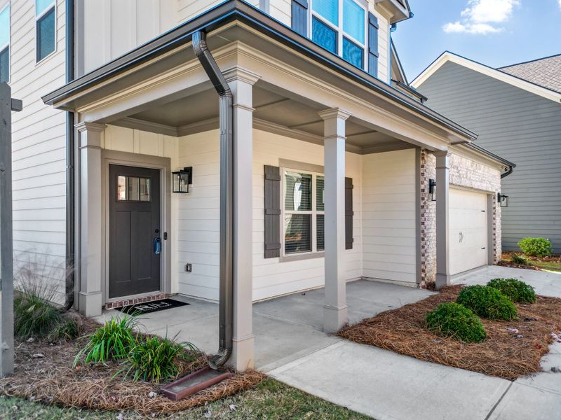 Exterior details and patio area of a home in Ridge Pointe, Athens (Image 3).