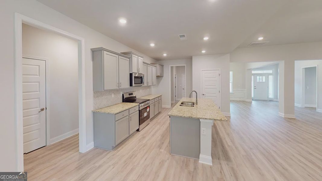 Furnished interior view inside a new home in Holliday Pass, Griffin (Image 7).