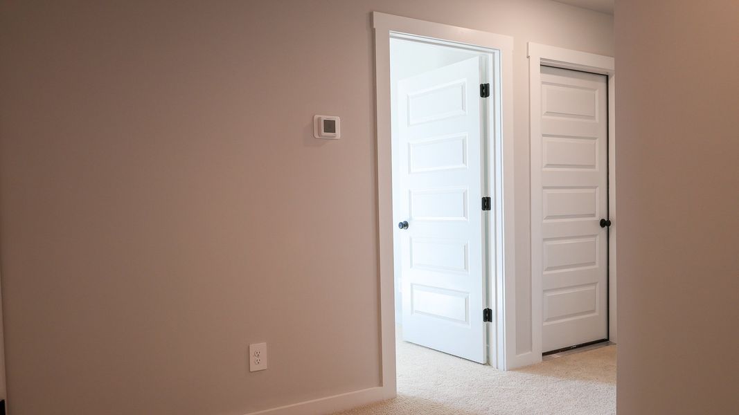 Representative unfurnished interior of a home built from the TISDALE by D.R. Horton in Harvest Point, Spring Hill (Image 45).