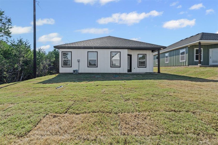 Exterior details and patio area of a home in , Granbury (Image 28).