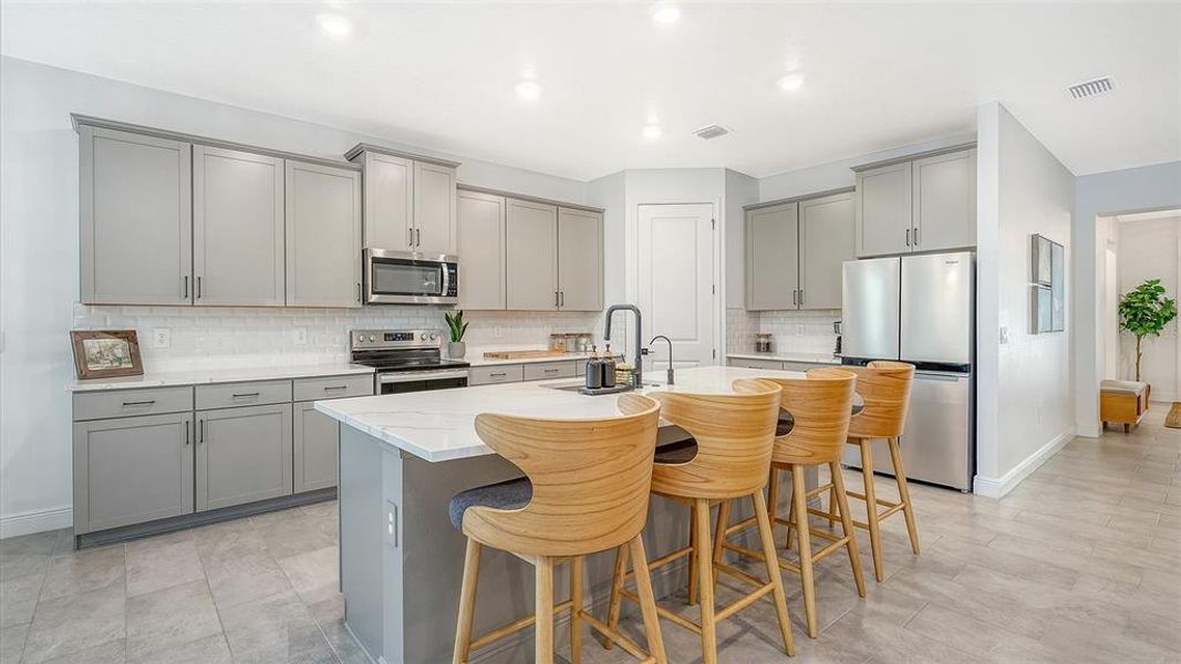 Furnished interior view inside a new home in Star Farms at Lakewood Ranch, Bradenton (Image 6).