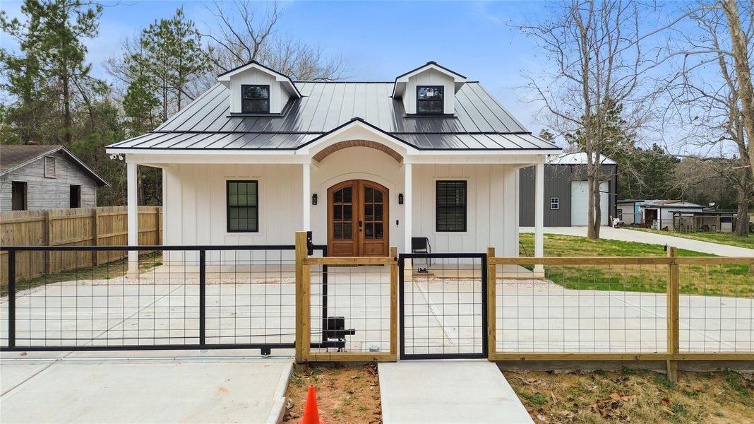 Front exterior of a new home in , Shepherd, TX, highlighting curb appeal (Image 2).