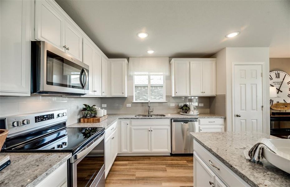 *Model Representation - Abundant cabinet space in kitchen