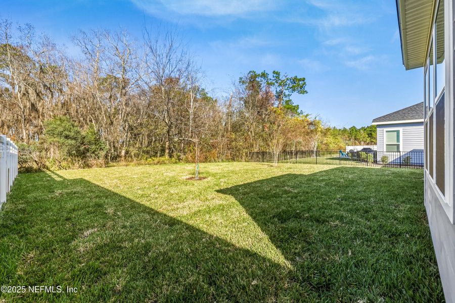 Exterior details and patio area of a home in Silver Landing at SilverLeaf, St. Augustine (Image 31).