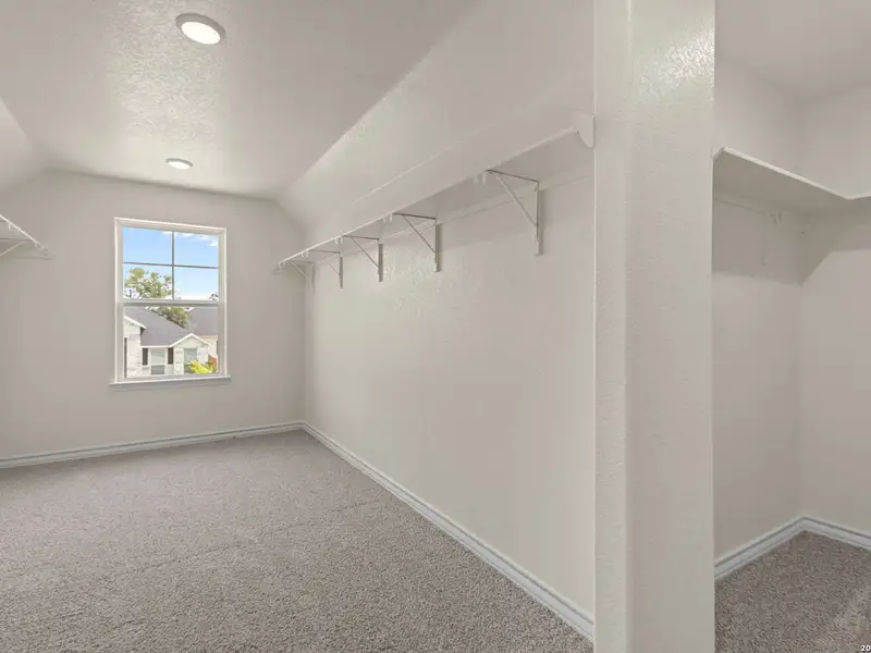 Spacious, unfurnished interior of a new home in The Reserve at Potranco Oaks, Castroville (Image 40).