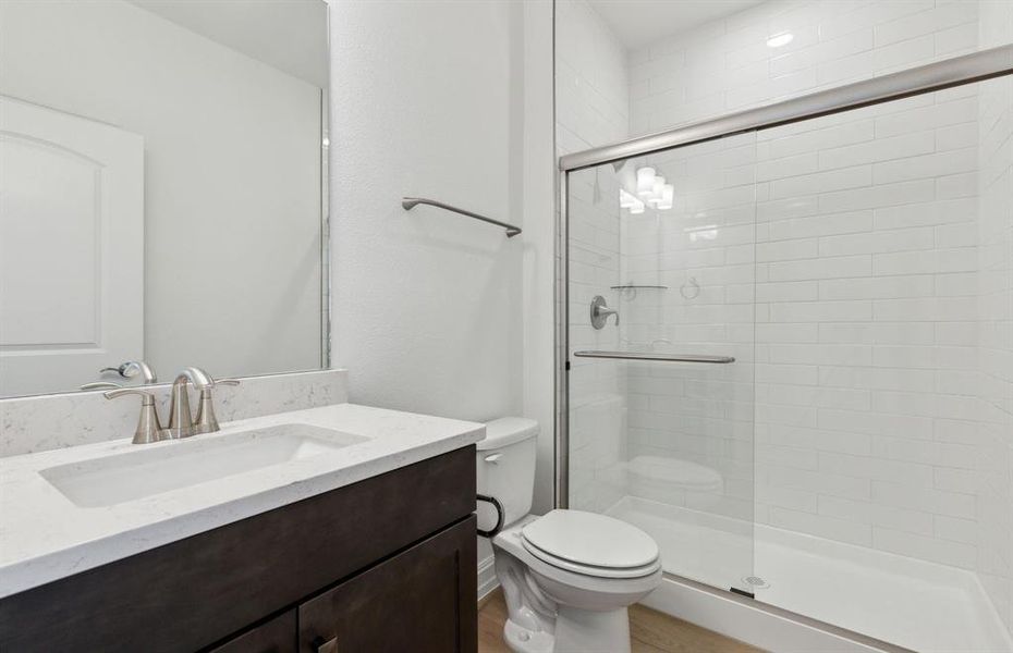 Upgraded secondary bathroom *real home pictured