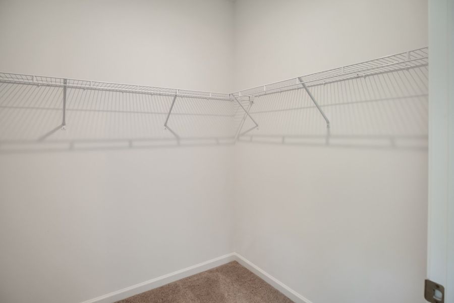 Spacious, unfurnished interior of a new home in Marlin Pointe, White House (Image 22).