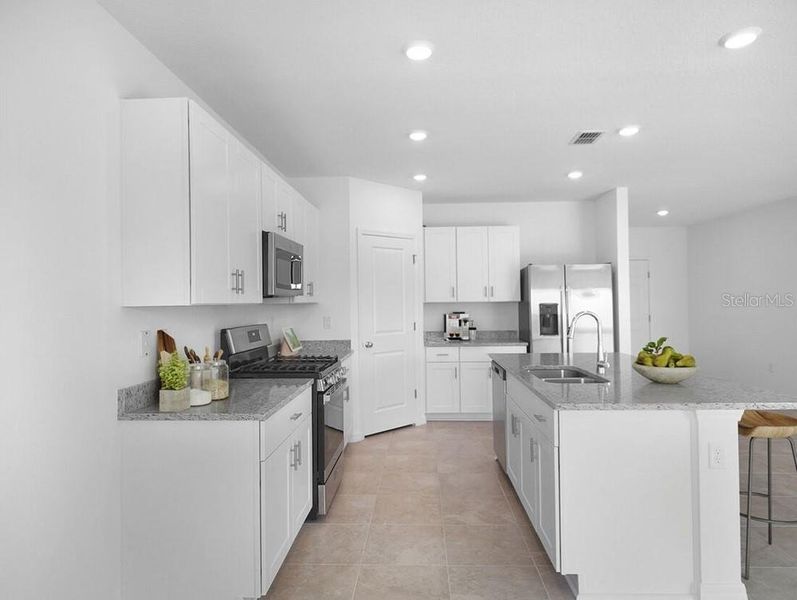 Furnished interior view inside a new home in Firethorn, Parrish (Image 30).