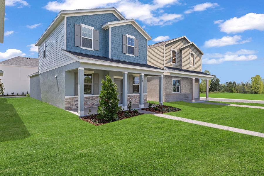 Front exterior of a new home in Brack Ranch, St. Cloud, FL, highlighting curb appeal (Image 25). Front exterior of a new home in Brack Ranch, St. Cloud, FL, highlighting curb appeal (Image 25).