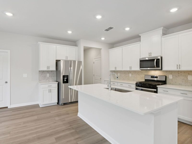 Furnished interior view inside a new home in Harmony Manor, Fairburn (Image 7).