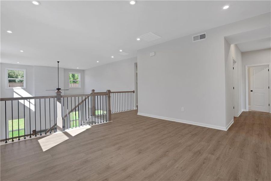 Spacious, unfurnished interior of a new home in The Paddocks at Doc Hughes, Buford (Image 49).