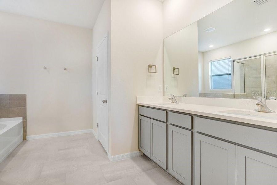 Furnished interior view inside a new home in Westgate at Avalon Park, Wesley Chapel (Image 28).