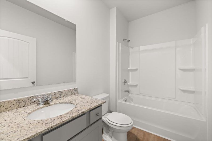 Furnished interior view inside a new home in Northwoods at Mirror Lake, Villa Rica (Image 11).