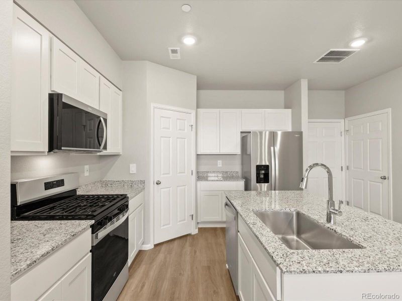 Furnished interior view inside a new home in Poudre Heights: The Meadow Collection, Windsor (Image 6). Furnished interior view inside a new home in Poudre Heights: The Meadow Collection, Windsor (Image 6).