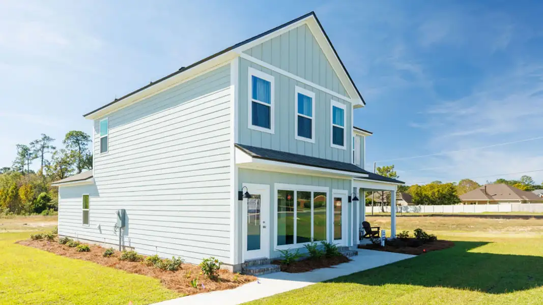 Front exterior of a new home in Abilene Acres, Tallahassee, FL, highlighting curb appeal (Image 20). Front exterior of a new home in Abilene Acres, Tallahassee, FL, highlighting curb appeal (Image 20).