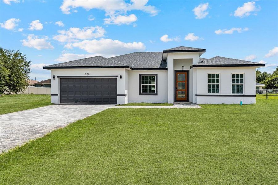 Front exterior of a new home in , Ocala, FL, highlighting curb appeal (Image 25).