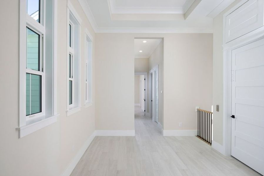 Representative unfurnished interior of a home built from the Grand Wayfarer by Minto Communities in Latitude Margaritaville Watersound, Panama City Beach (Image 17).