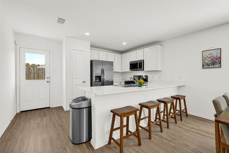 Furnished interior view inside a new home in Townsend Reserve: Cottage Collection, Splendora (Image 10). Furnished interior view inside a new home in Townsend Reserve: Cottage Collection, Splendora (Image 10).