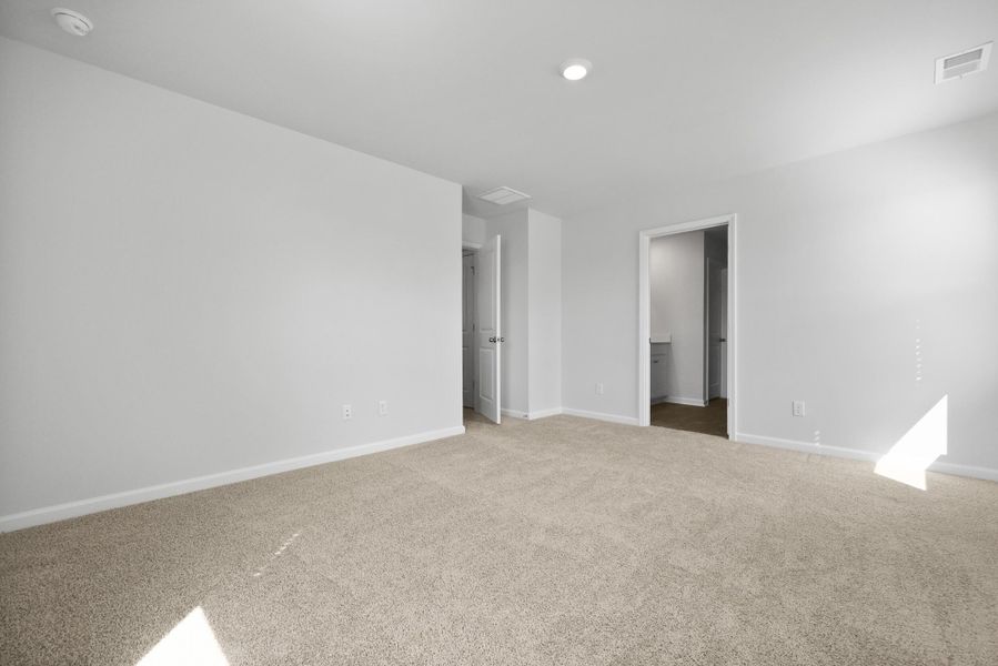 Spacious, unfurnished interior of a new home in Pine Hills at Cane Bay, Summerville (Image 18).