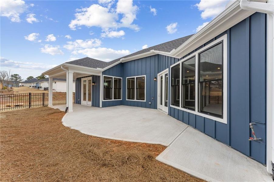 Exterior details and patio area of a home in The Courtyards at Redbud Lane, Holly Springs (Image 4). Exterior details and patio area of a home in The Courtyards at Redbud Lane, Holly Springs (Image 4).