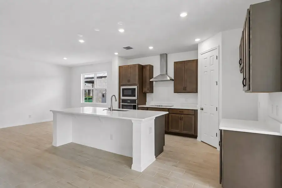 Furnished interior view inside a new home in Harrell Oaks, Orlando (Image 5).