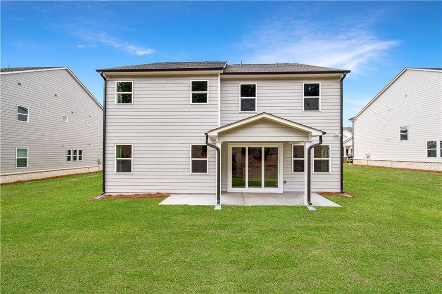 Exterior details and patio area of a home in Hillside Manor, Powder Springs (Image 4).