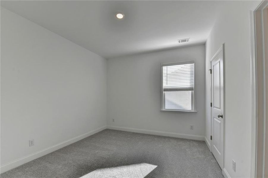 Spacious, unfurnished interior of a new home in Bailey Fence, Dacula (Image 66).