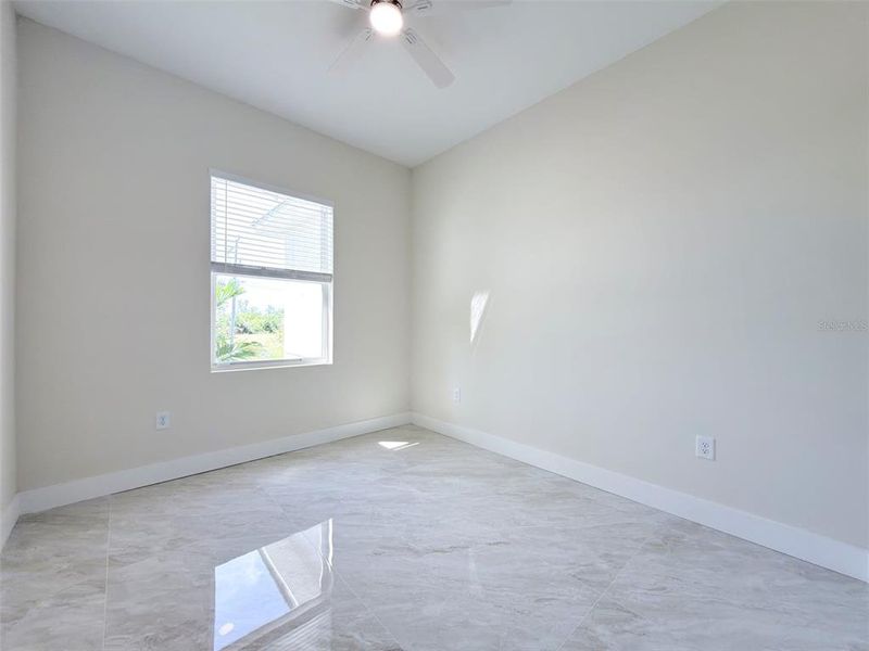 Spacious, unfurnished interior of a new home in , Port Charlotte (Image 39).