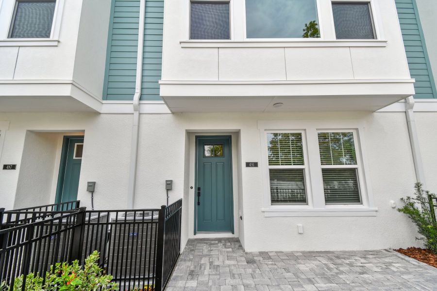 Exterior details and patio area of a home in Towns at Union, St. Petersburg (Image 2).