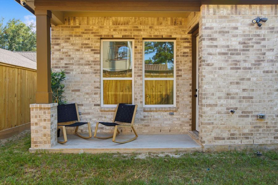 Exterior details and patio area of a home in , Houston (Image 3).