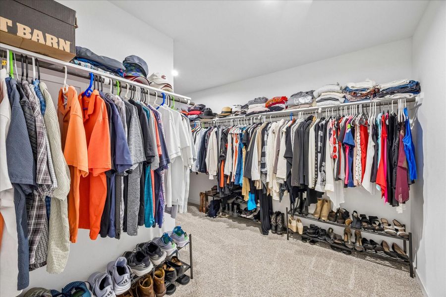 And this is the HUGE primary closet!  It is approximately 12' x 9'.