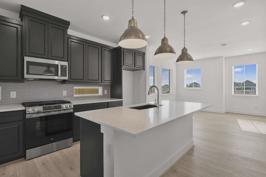 Representative furnished interior of a home built from the Riverdale by Chesmar Homes in Meridiana Courtyard Collection, Manvel (Image 6).