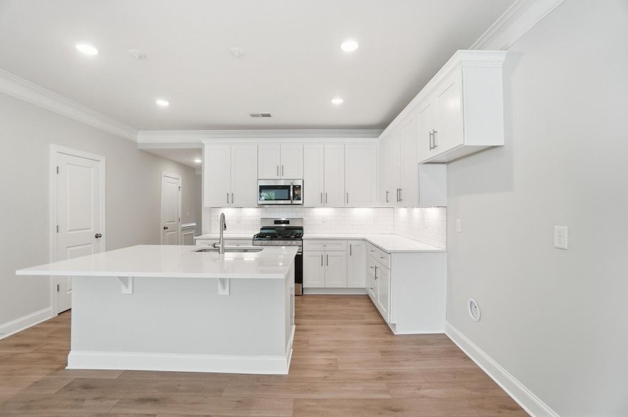 Furnished interior view inside a new home in Harrisburg Village Townhomes, Harrisburg (Image 7).