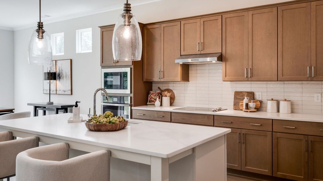 Kitchen with island and various cabinets and countertop spacing