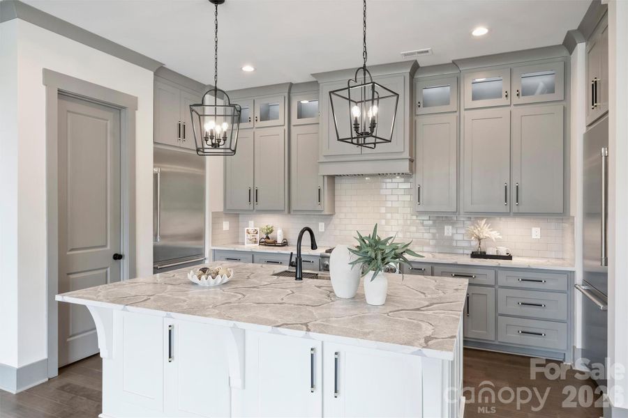 Gourmet Kitchen with oversized Island and 2 Thermador refrigerators Gourmet Kitchen with oversized Island and 2 Thermador refrigerators