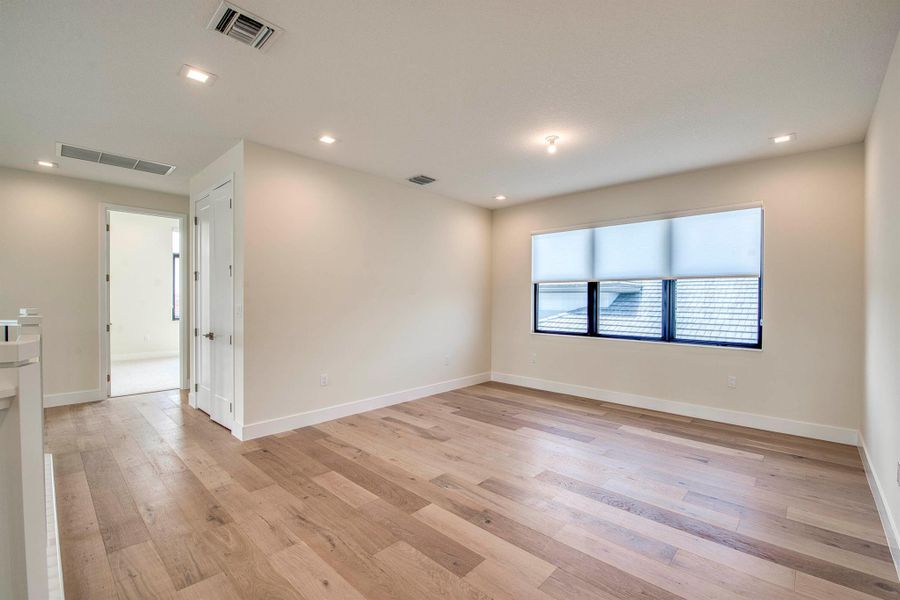 Furnished interior view inside a new home in Apex at Avenir, Palm Beach Gardens (Image 35).