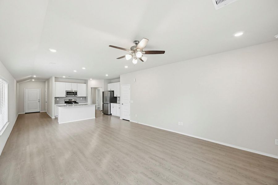 Vinyl plank floors offer low-maintenance living because weekends should be for relaxing, not carpet cleaning.