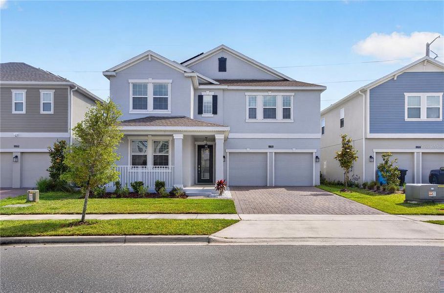 Front exterior of a new home in , Orlando, FL, highlighting curb appeal (Image 2). Front exterior of a new home in , Orlando, FL, highlighting curb appeal (Image 2).