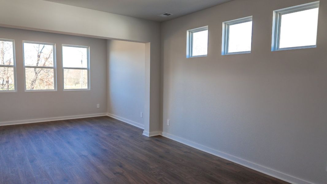 Representative unfurnished interior of a home built from the TISDALE by D.R. Horton in Harvest Point, Spring Hill (Image 25).