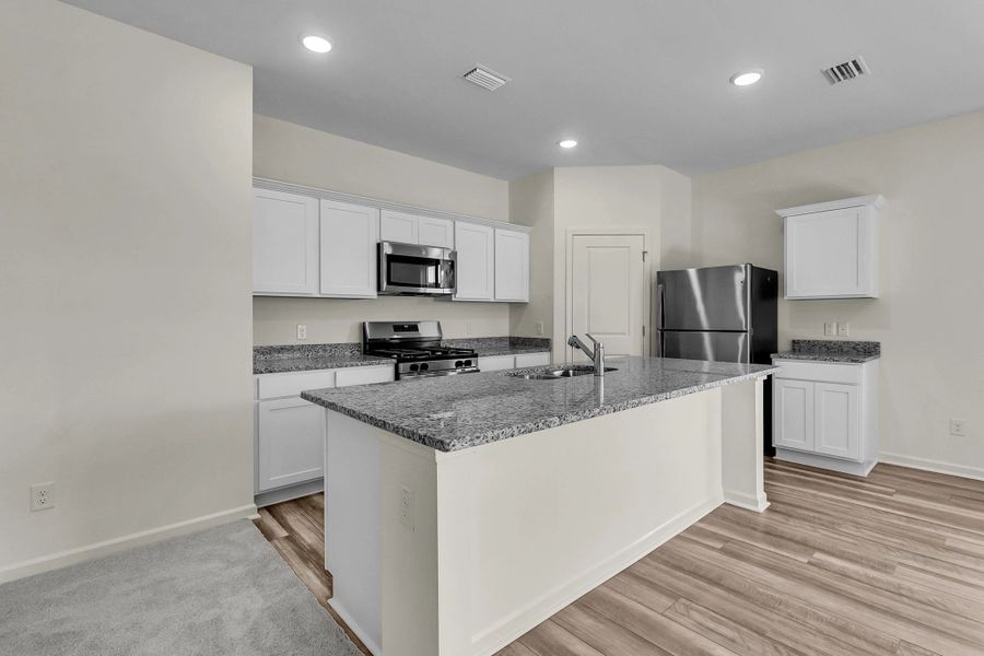 Representative furnished interior of a home built from the Supernova by Starlight Homes in Liberte, Converse (Image 10).