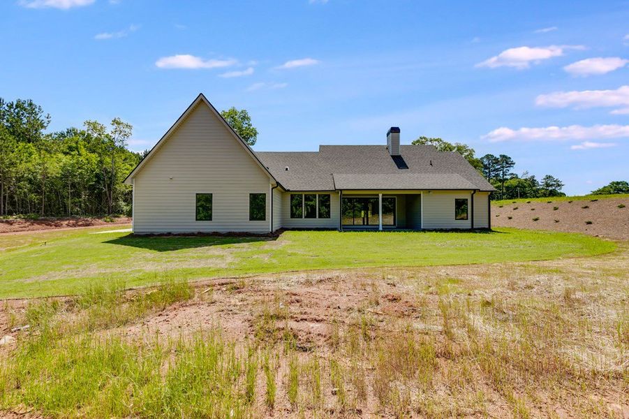 Exterior details and patio area of a home in Harmon Springs, Carrollton (Image 3).