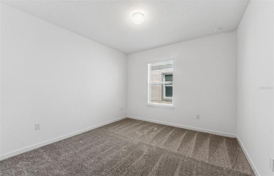Spacious, unfurnished interior of a new home in Riverwood, Zephyrhills (Image 9).
