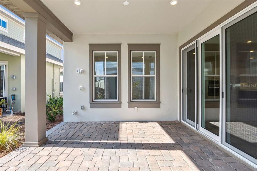 Exterior details and patio area of a home in Laureate Park (Craft Homes), Orlando (Image 3).