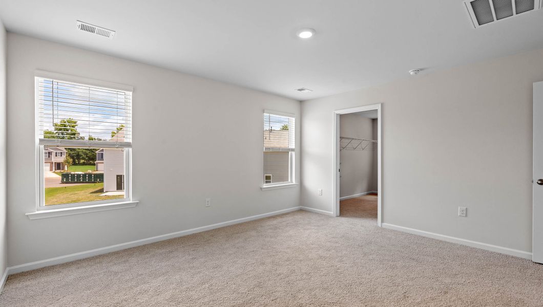 Representative unfurnished interior of a home built from the ELSTON by D.R. Horton in Harrier Point, Woodruff (Image 26).